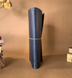 blue leather journal on a brown background