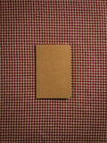 A small brown pocket sized paper notebook sized at 3" x 5.5"